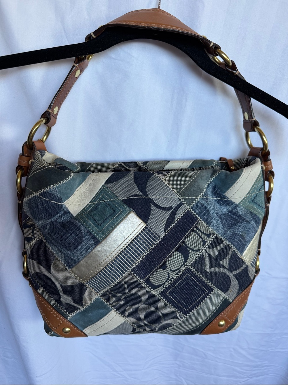 Coach Blue Patchwork Canvas
Hobo Bag with Brown Leather
Trim